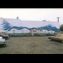 1986 09 19 Brewery Creek Mural Project light grey building blue designs Linda Neville