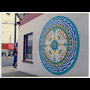1986 09 19 Brewery Creek Mural Project building with blue green white circular design Anne Beesack